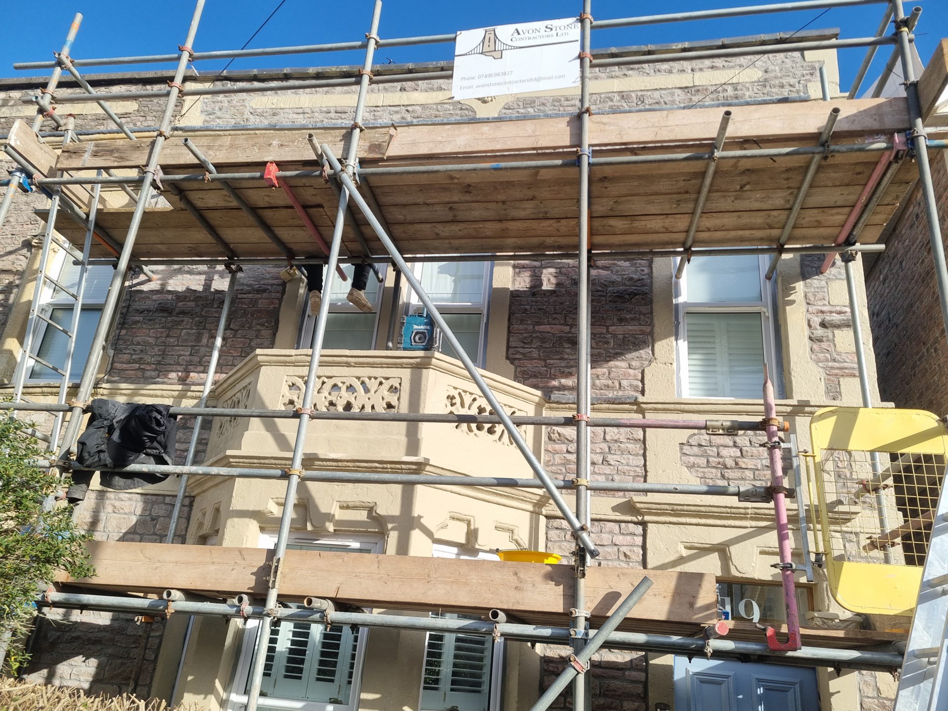 Brick wall undergoing professional repointing
