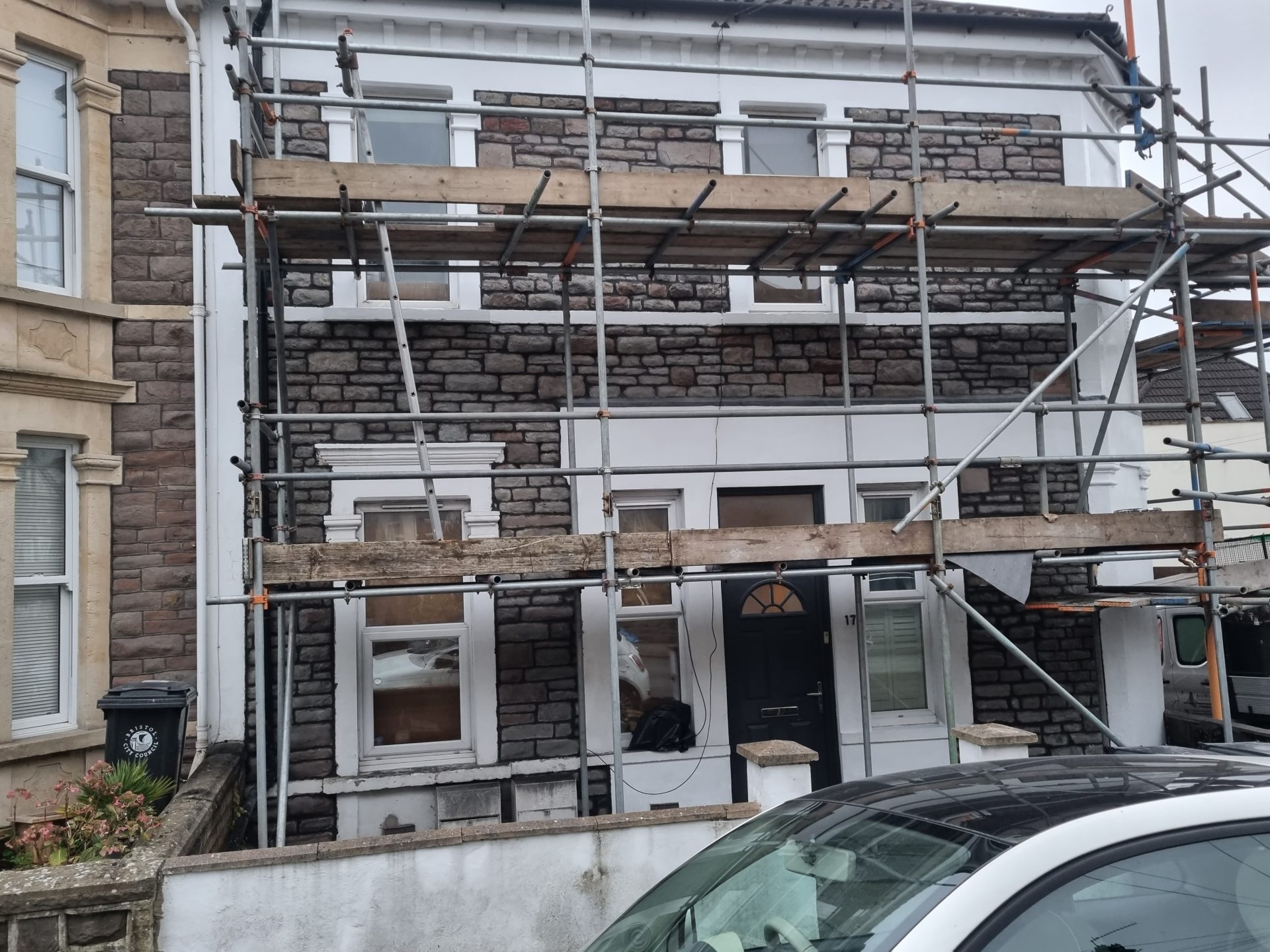 Brick wall undergoing professional repointing